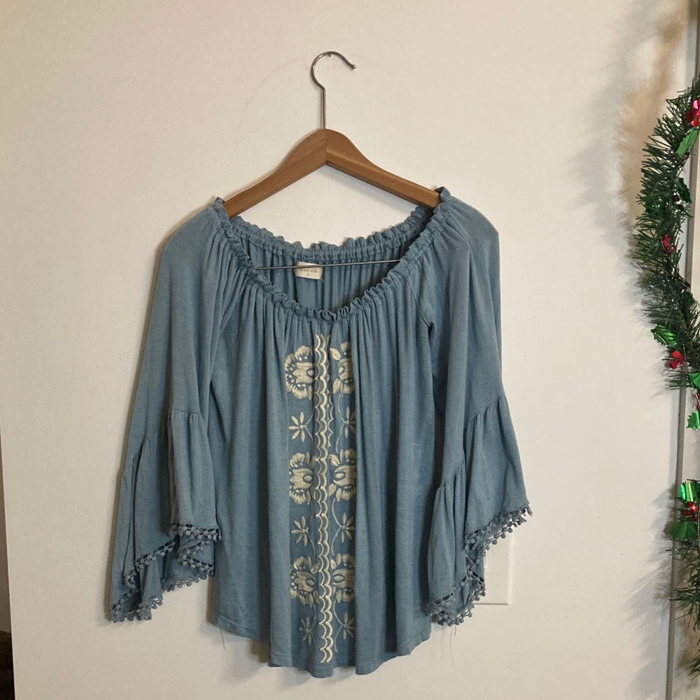 Off the shoulder blue shirt